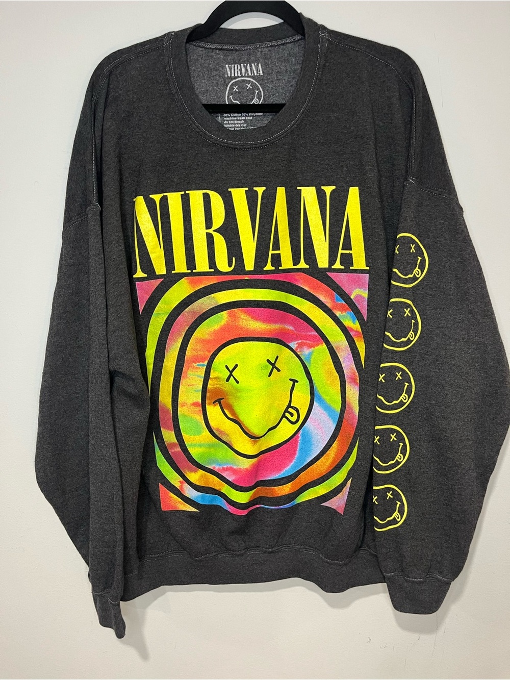 NIRVANA Black Crewneck with Neon Tie-Dye Smiley Graphic